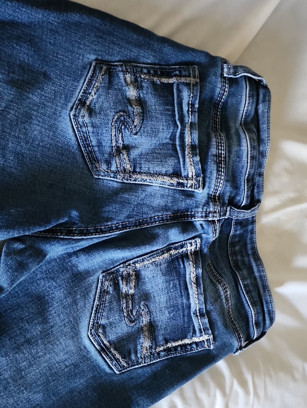 Silver Jeans Dark Blue Skinny Jeans with Distressed Back Pockets